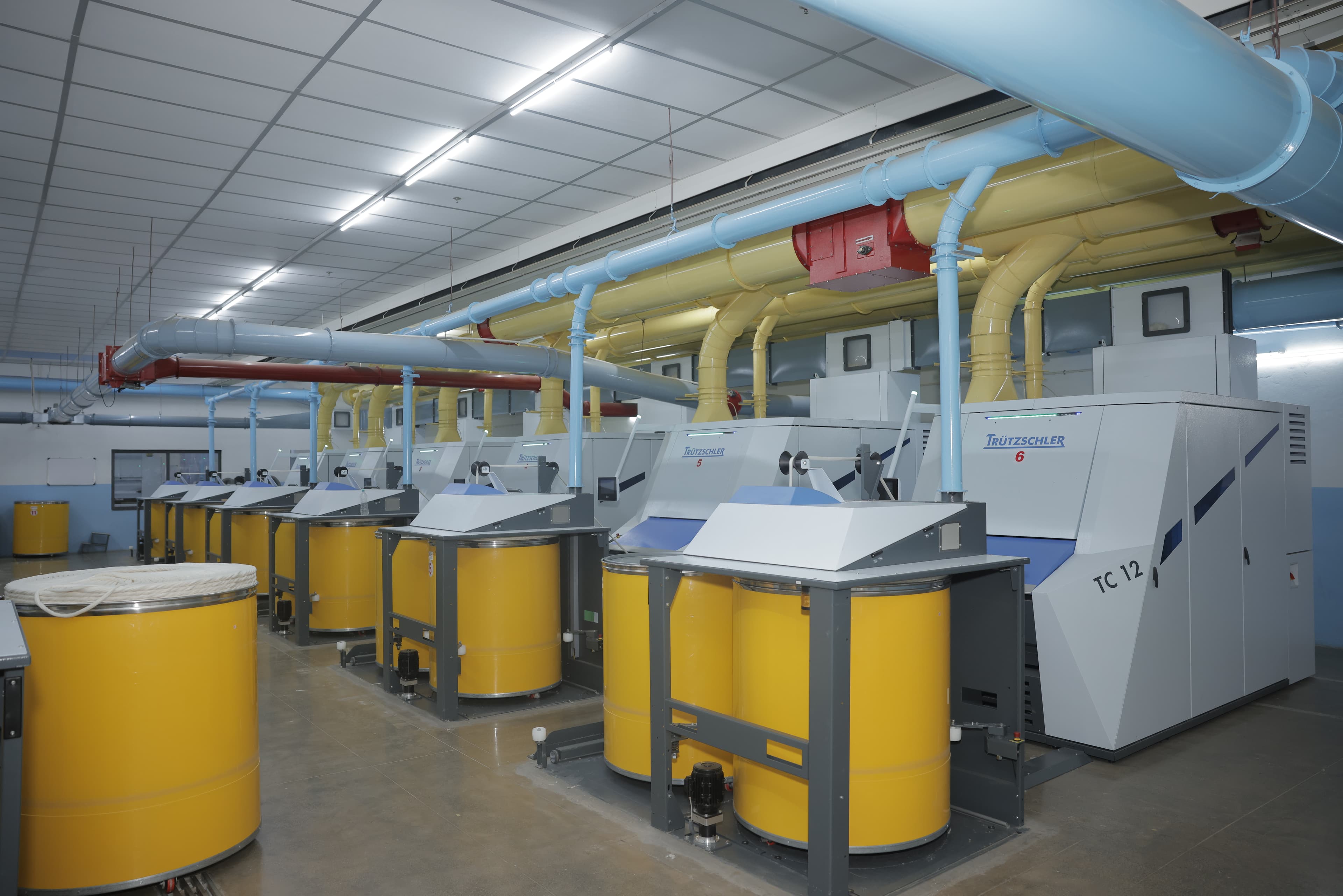 Carding machine floor at Umed Group's spinning unit