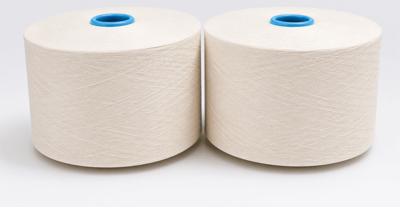 Open-end cotton yarn spools — 100% cotton grey yarn manufactured by Umed Group