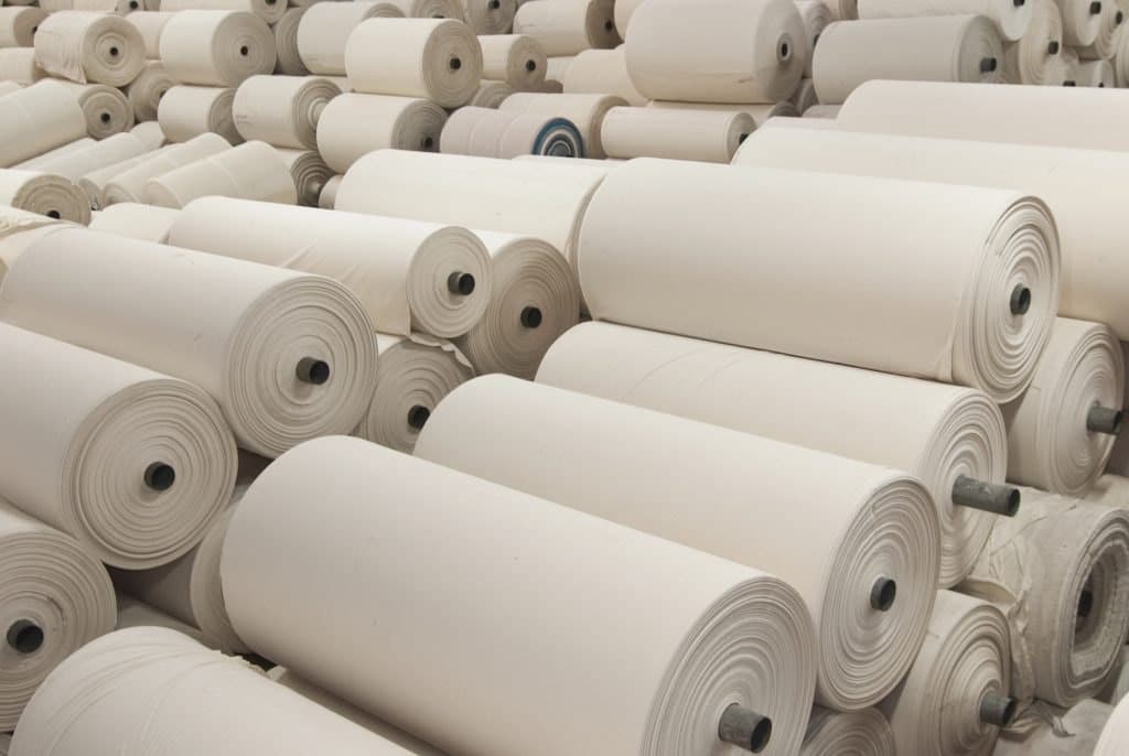 Woven grey fabric manufacturing — heavy canvas and duck fabric produced by Umed Group
